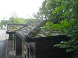 View of roof of Toll House at NW end of Whorlton Bridge from right side May 2016